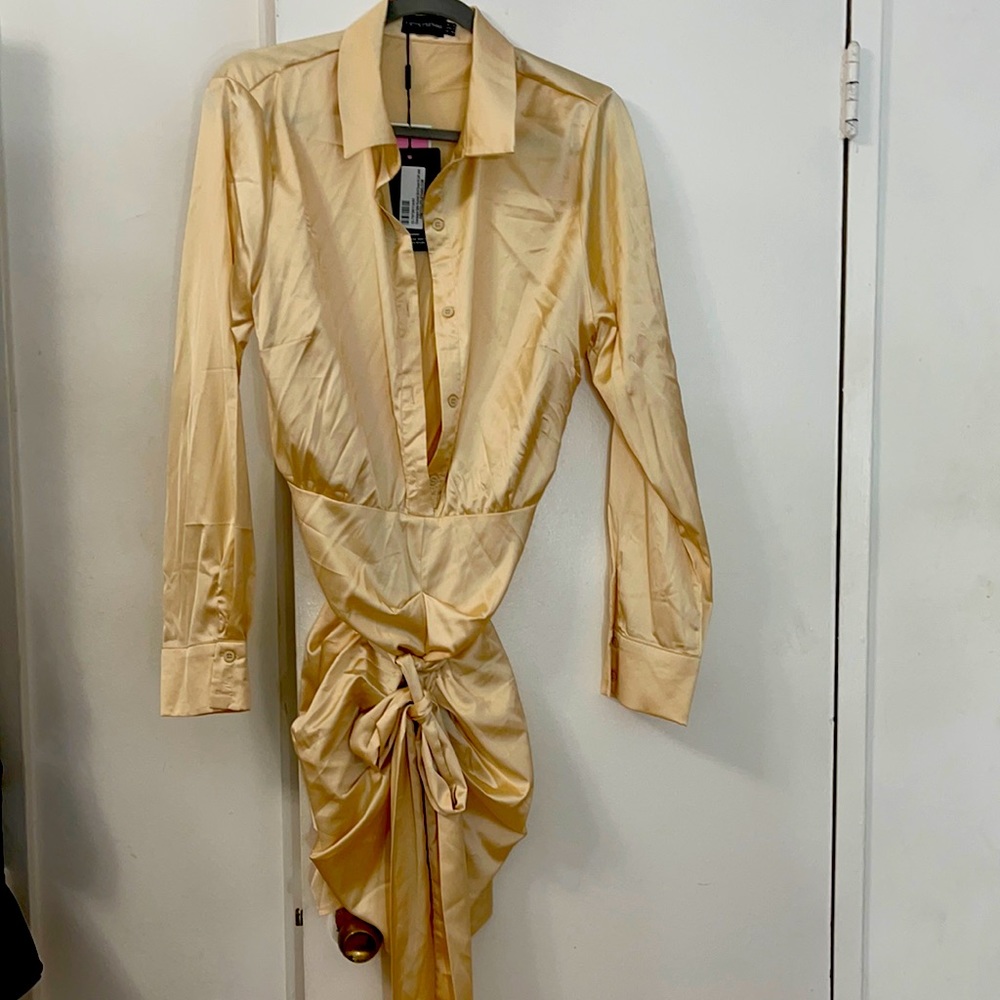 Silk blouse shirt dress, never worn and definitely an eye catcher.